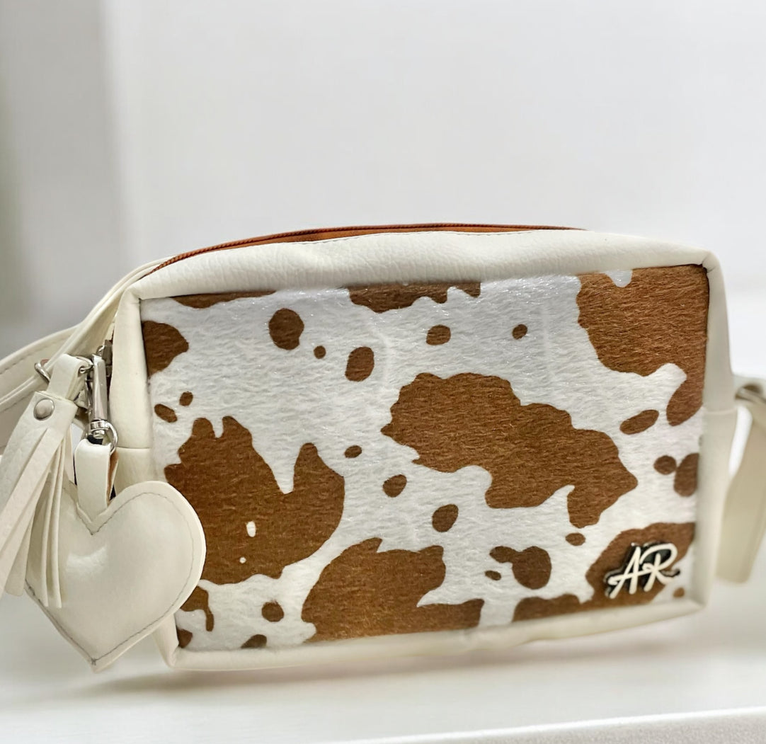 Bandolera Cow print + Charms