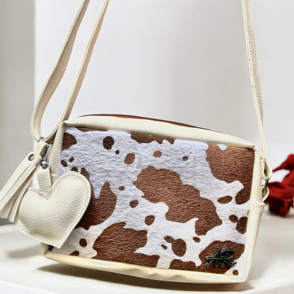Bandolera Cow print + Charms